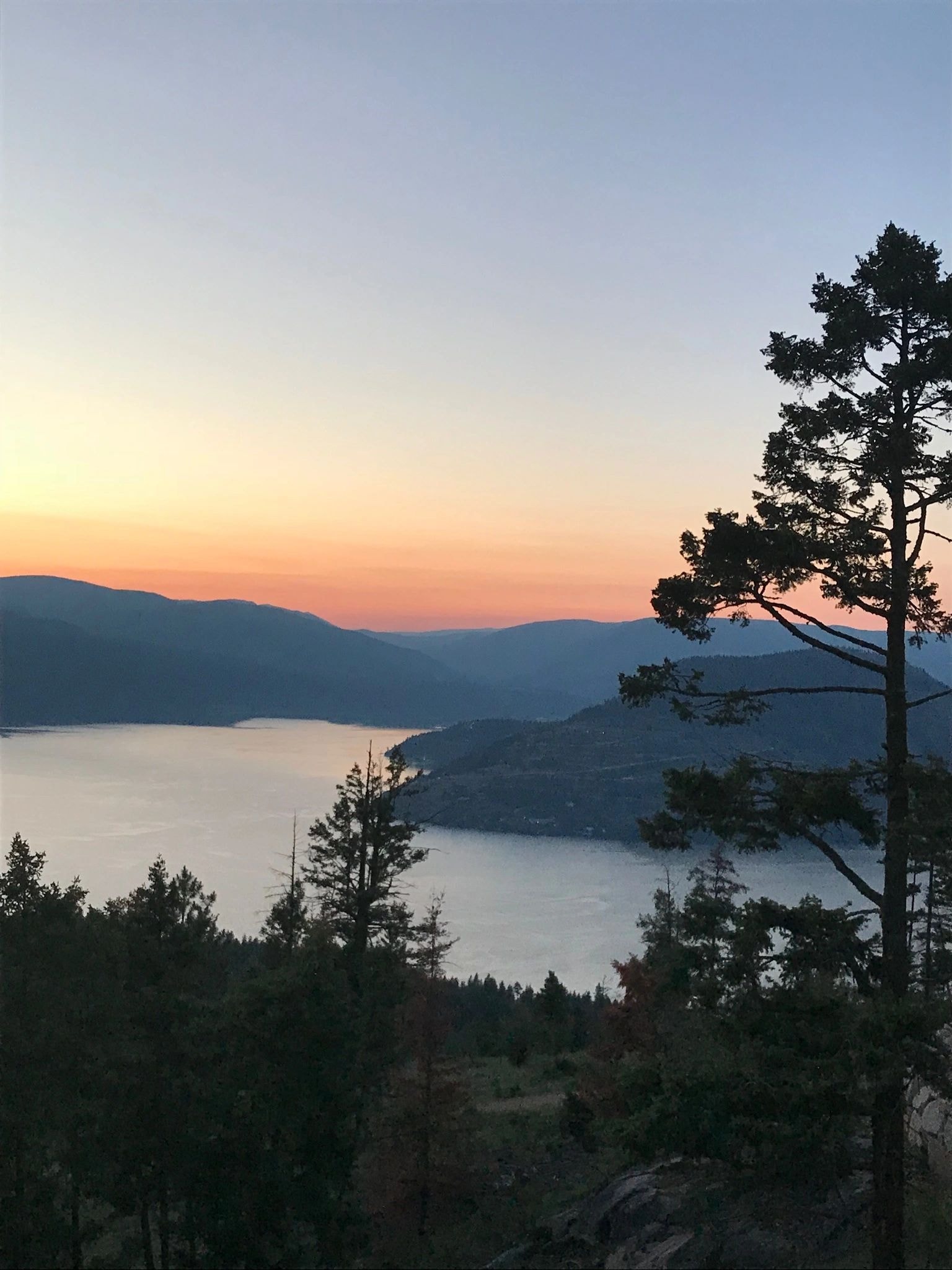 Serene mountain lake at sunset